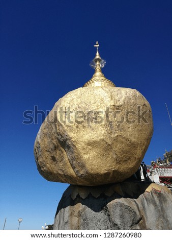 The Golden Rock : The miracle of balance the Big Rock still stand on the cliff that make the people around the world go to see the miracle.