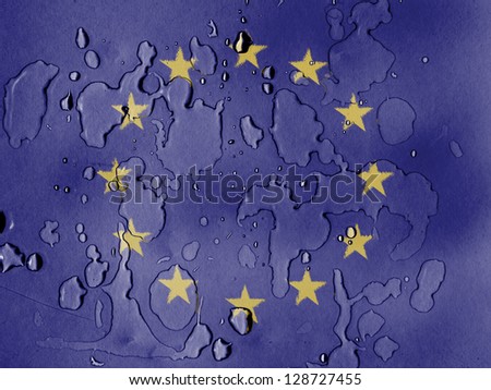Europe Union flag painted on covered with water drops