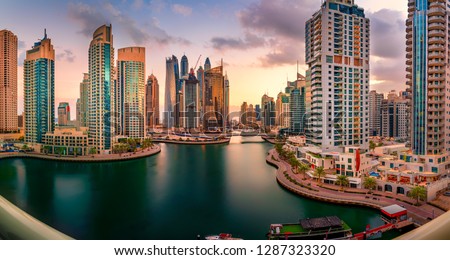 Beautiful skyline of Dubai Marina at sunrise in United Arab Emirates Royalty-Free Stock Photo #1287323320