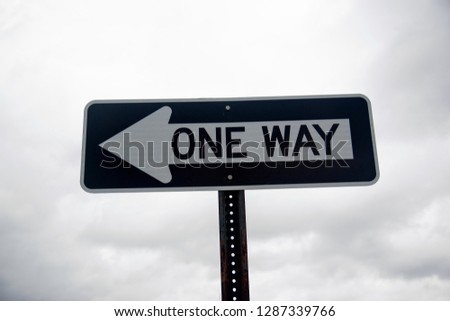 On Way Street Sign Arrow With Cloudy Background