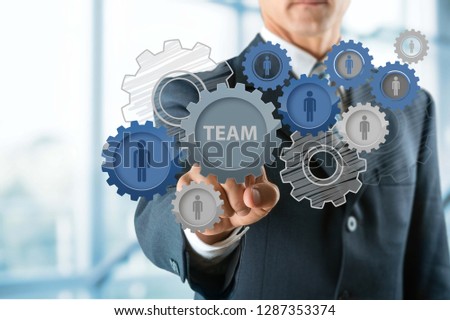 Businessman and analytics symbols on grey background
