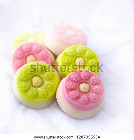 Of colorful confections, candy, sponge cake. Square photo size.