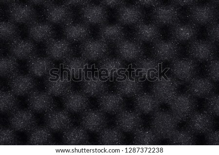 Black music studio texture, wall background, pattern. Sound room's pyramid wall. 