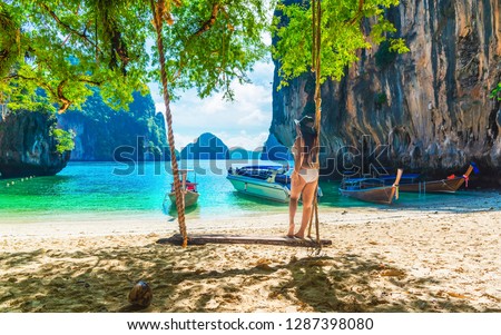 Lifestyle traveler woman in bikini joy beautiful nature scenic landscape island, Famous landmark travel Phuket Thailand summer fun beach, Tourism destination place Asia, Tourist holiday vacation trips