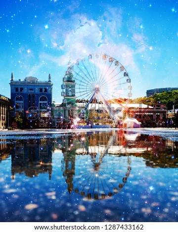 Kiev hem, a Ferris wheel reflected in a puddle, a collage with a cosmic picture