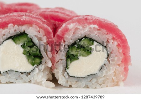 Traditional japanese sushi rolls on white background
