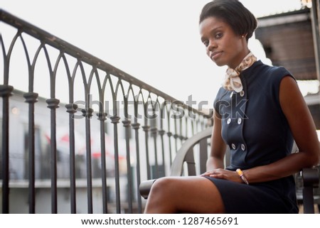 Woman sitting on balcony
