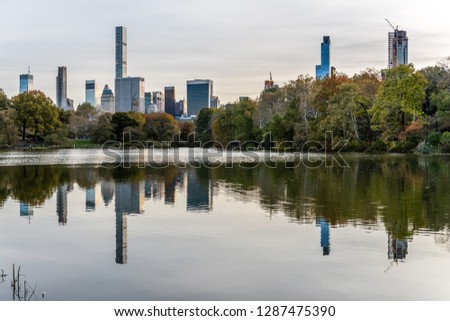 The Buildings of Midtown Manhattan Are Reflected in New York City's Central Park Pond