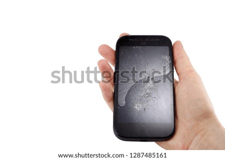 broken phone in hand isolated on white background, crash phone, fractured, smartphone repair, regret