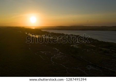Beautiful sunset aerial image over the dunes of Balneário Rincão - Santa Catarina - Brazil
