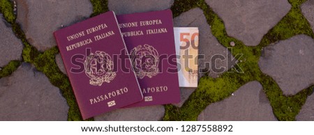 passports and fifty euros are the paving stone in Rome