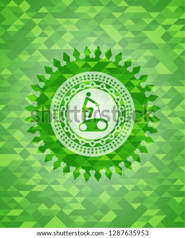 stationary bike icon inside green mosaic emblem