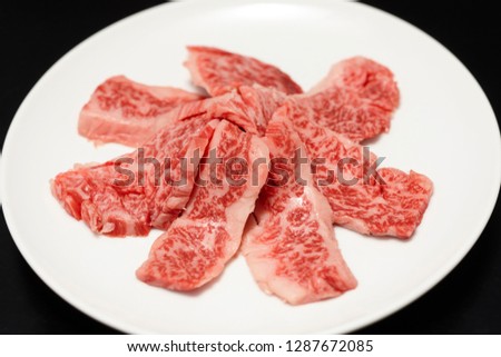A menu of grilled meat shops. Meat on a dish. A barbecue menu using Wagyu beef.