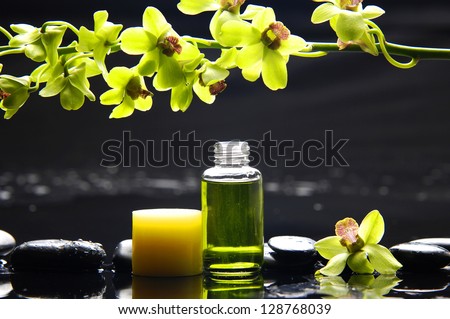 Branch Green orchid and candle ,massage oil on therapy stones