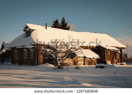 Old house of Russia. Winter picture