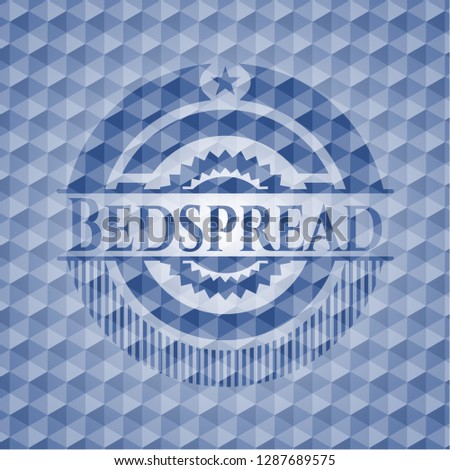 Bedspread blue emblem with geometric background.