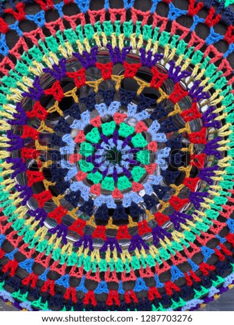 Bright vibrant colored yarn wheel cover