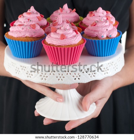 Woman with delicious cup cake