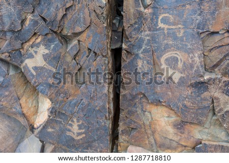 the ancients Petroglyphs in Tamgaly Tash in Kazakhstan