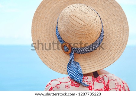 Summer time. Woman with sea and sky background. Relaxing time
