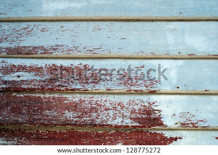 peeling painted wooden wall.