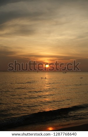 Beautiful bright orange sunset. Ong Lang beach, Phu Quoc, Vietnam. No filters image.