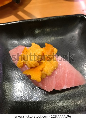It is a picture of Tuna and Unzen sushi
