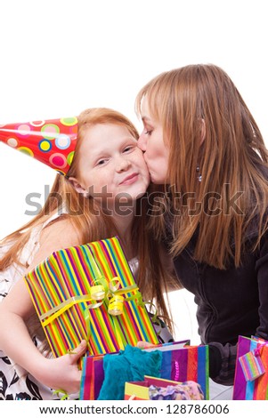 picture of happy mother and daughter with gift box