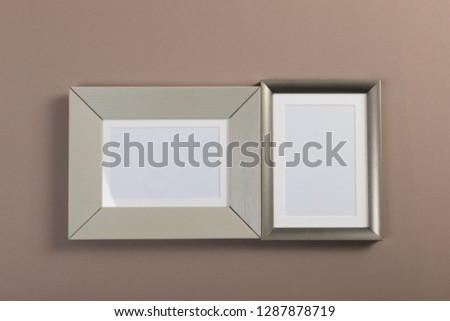 frames on gray and red background