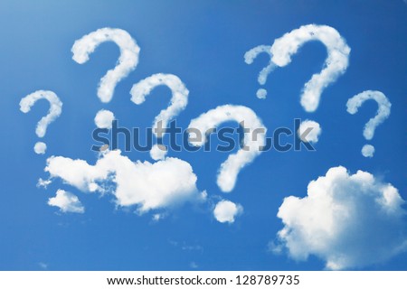Question mark shaped clouds on blue sky Royalty-Free Stock Photo #128789735