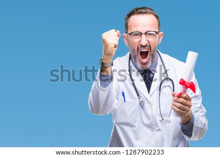 Middle age senior hoary doctor man holding degree certificate over isolated background annoyed and frustrated shouting with anger, crazy and yelling with raised hand, anger concept