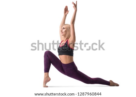 Slim blonde practicing yoga isolated view