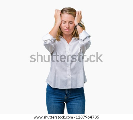 Beautiful young business woman over isolated background suffering from headache desperate and stressed because pain and migraine. Hands on head.