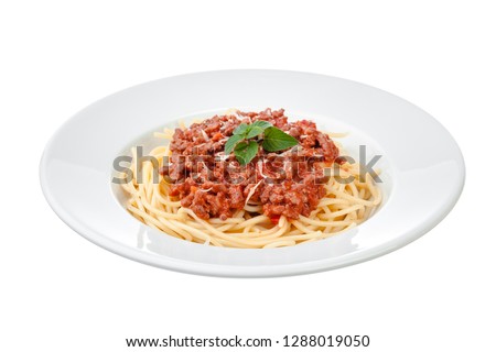 Spaghetti bolognese sauce with beef or pork,cheese,tomatoes and spices on white plate Royalty-Free Stock Photo #1288019050