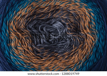 ball of colored threads closeup macro, abstract circular background