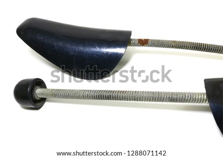  shoe shaper has a black-colored steel to be used. Put on a white background