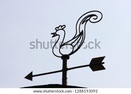 Chicken and arrow sign