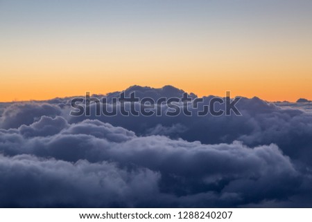 Dramatic Clouds and a Sunset Sky, Viewed from an Airplane