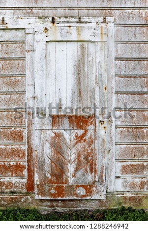Vintage door built in 1850s at the old dairy ranch of  Pierce Point Ranch. Point Reyes National Seashore, Marin County, California, USA.