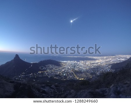Beautiful pictures of Cape Town during sunset of the cliffs of Table Mountain in South Africa 