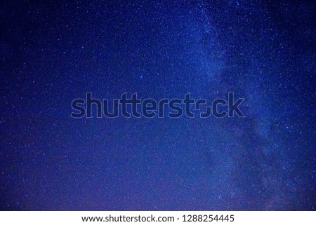 Night starry sky and star tracks 