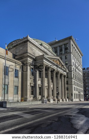 Bank of Montreal Main Branch - a Pantheon-like building is located on Place d'Armes from Notre-Dame Basilica in Old Montreal, Quebec, Canada. Bank of Montreal is oldest bank in Canada founded in 1817.