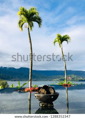 Overlooking a pool that is overlooking the ocean in Kauai
