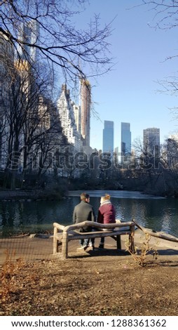 Boy and girl talking. Central park. New York