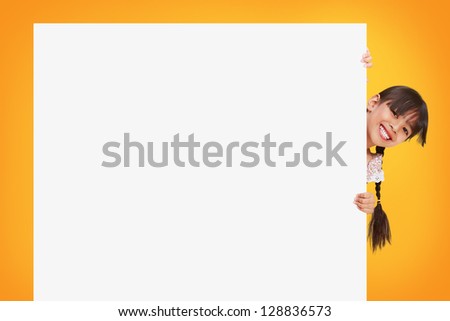 Little girl looking out of the blank sheet of paper