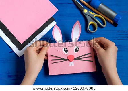 How to make envelope in form of bunny for Easter greetings. Children's art project. DIY concept. Step by step photo instruction. Step 12. Final result