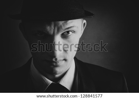 Gangster view.Vintage retro style portrait Royalty-Free Stock Photo #128841577