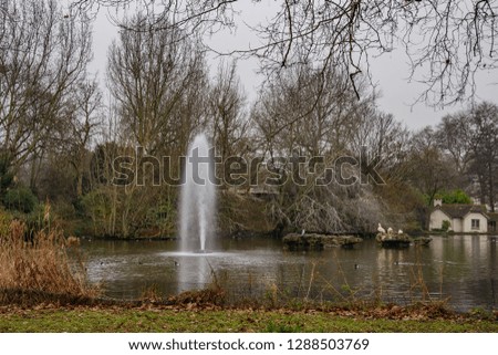 Scenic view of the beautiful James Park. Outdoor photography in a rainy day in London, United Kingdom