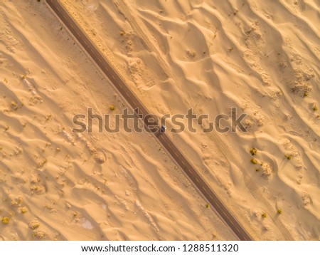 aerial view of highway on the gobi desert xinjiang 