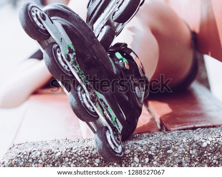 Active fun leisure sporty spring summer exercising outdoor activities concept. Closeup roller skates.